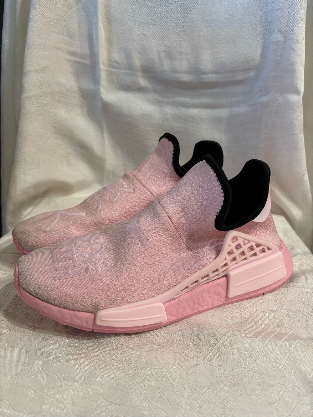 adidas x Pharrell Human Race Pink Slip-On Knit Sneakers with Black Collar Trim